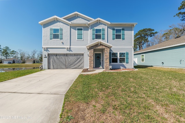 view of front of home with a garage, driveway, stone siding, and a front yard