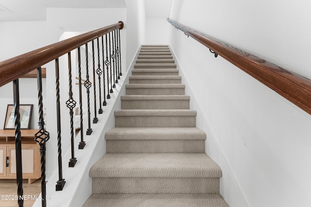 staircase with visible vents