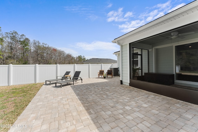 view of patio / terrace with a ceiling fan and a fenced backyard