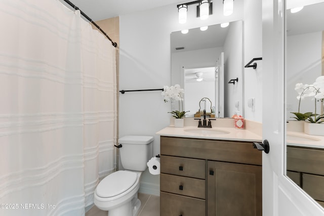 full bathroom with visible vents, vanity, and toilet