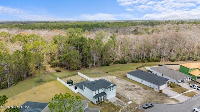 aerial view featuring a forest view