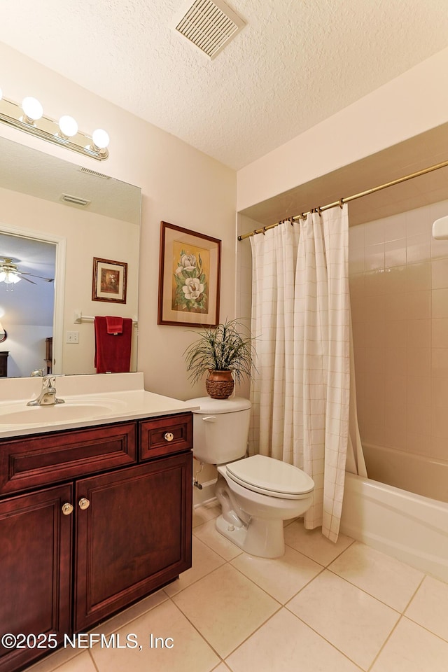 3383 Olympic Dr, Green Cove Springs, FL 32043 - full bathroom with tile patterned floors, toilet, visible vents, and vanity