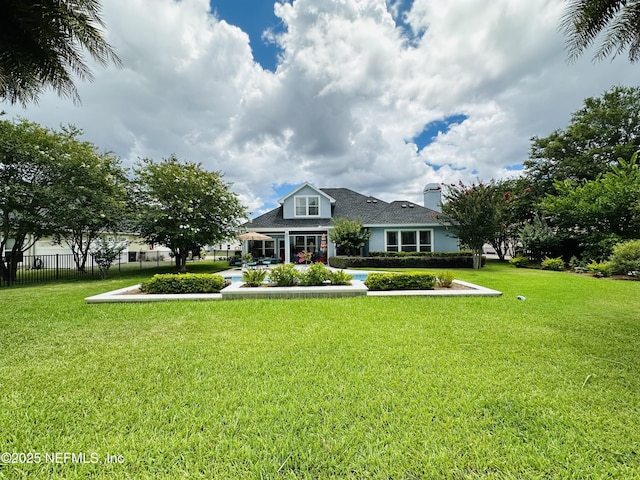 3383 Olympic Dr, Green Cove Springs, FL 32043 - bungalow-style house featuring a front lawn and fence