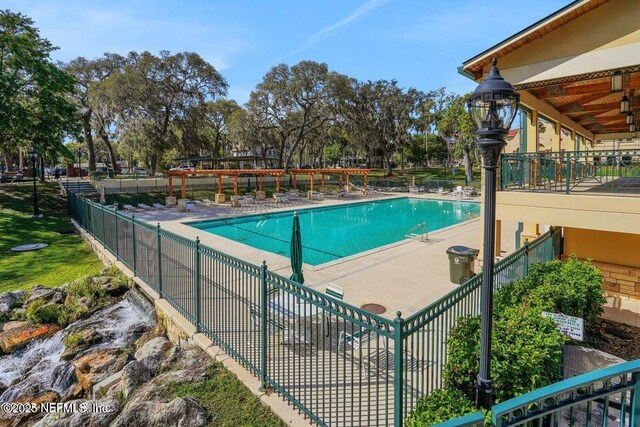 3383 Olympic Dr, Green Cove Springs, FL 32043 - pool featuring fence