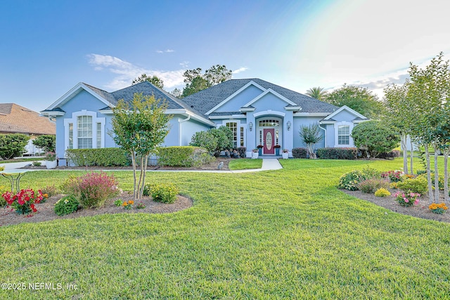 3383 Olympic Dr, Green Cove Springs, FL 32043 - single story home with a front lawn and stucco siding