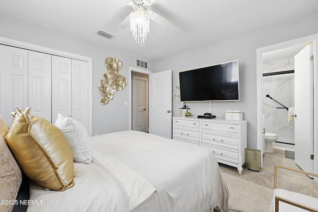 10605 Arnez Rd, Jacksonville, FL 32218 - bedroom with a ceiling fan, a closet, visible vents, and a textured ceiling