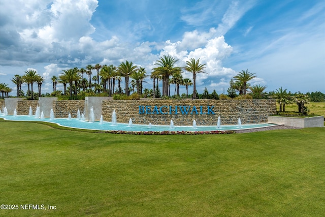 community sign with a lawn