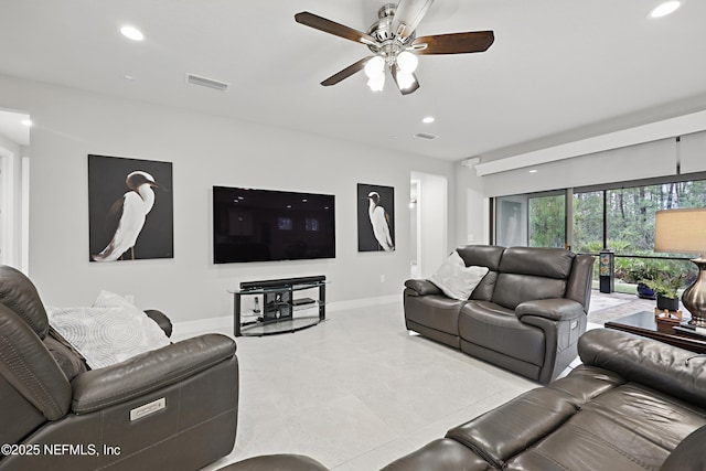 living area featuring recessed lighting, visible vents, ceiling fan, and baseboards