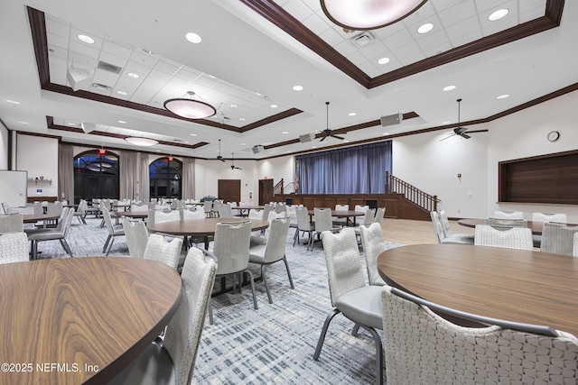 dining room featuring recessed lighting, a ceiling fan, baseboards, ornamental molding, and a raised ceiling