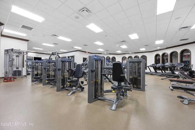 workout area featuring a paneled ceiling and visible vents