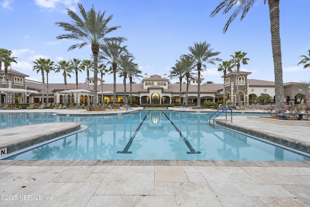 pool with a patio