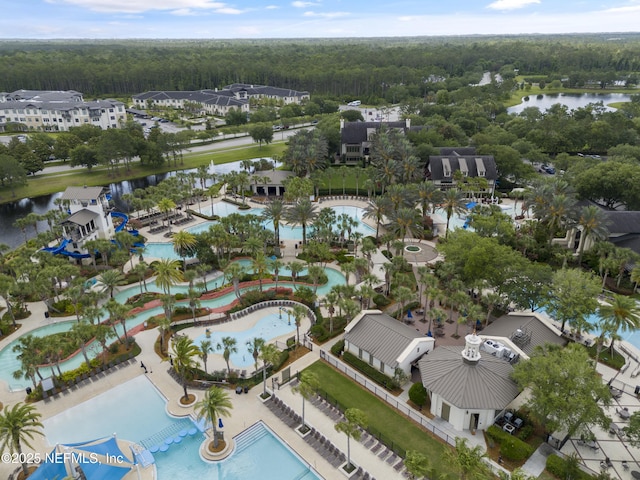 birds eye view of property featuring a water view and a residential view