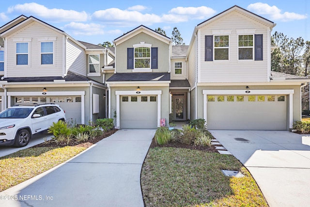 view of front of house with a garage and driveway