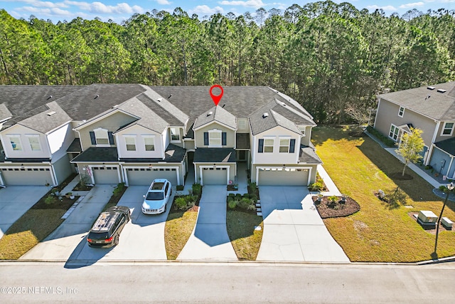 drone / aerial view with a residential view