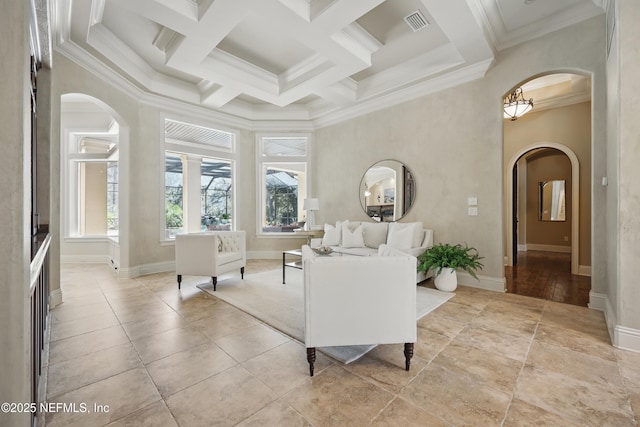 interior space featuring a high ceiling, plenty of natural light, visible vents, and arched walkways