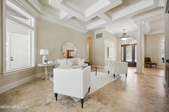 living room with arched walkways, crown molding, visible vents, and ornate columns