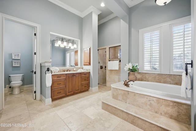 full bathroom featuring toilet, vanity, tiled shower, a bath, and crown molding