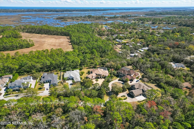 bird's eye view with a water view and a residential view