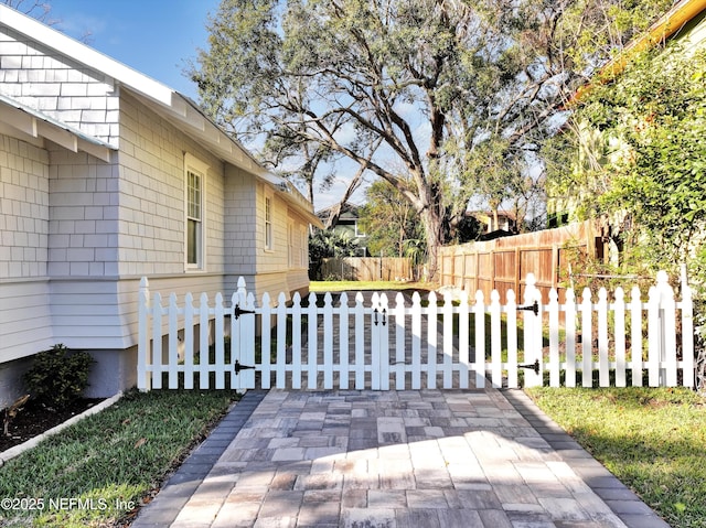 view of side of property with fence private yard