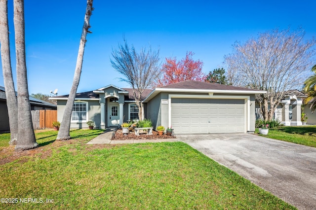 ranch-style home with concrete driveway, stucco siding, an attached garage, fence, and a front yard