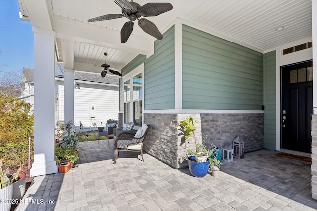 view of patio / terrace with visible vents and a ceiling fan