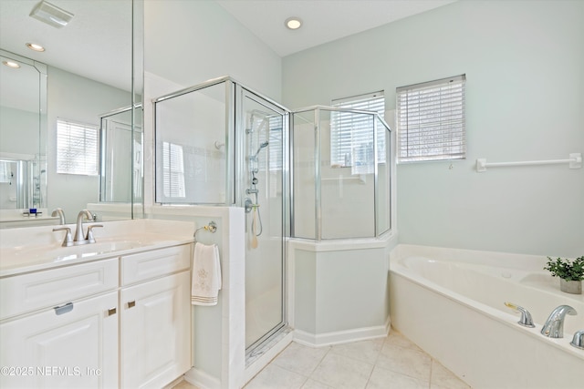 bathroom featuring a garden tub, recessed lighting, a shower stall, vanity, and tile patterned floors