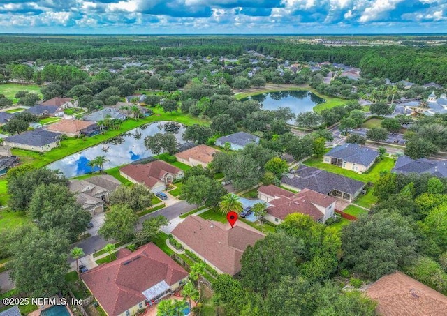 bird's eye view featuring a water view and a residential view