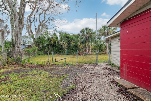 view of yard featuring fence