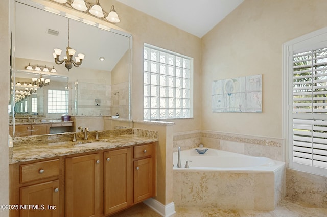 bathroom featuring visible vents, a tile shower, vaulted ceiling, a chandelier, and a bath