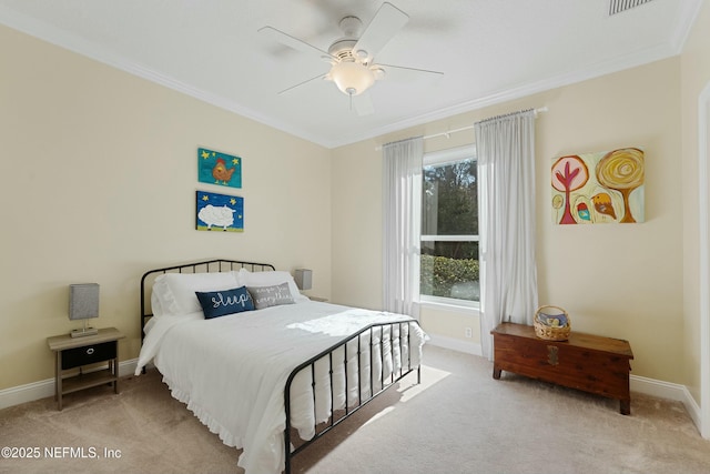 bedroom with carpet floors and crown molding