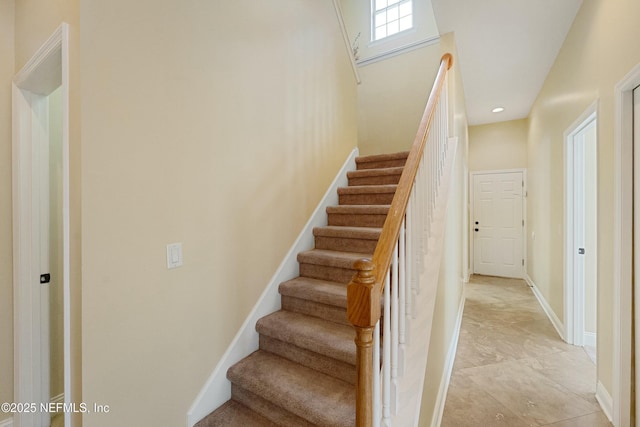 stairway with baseboards