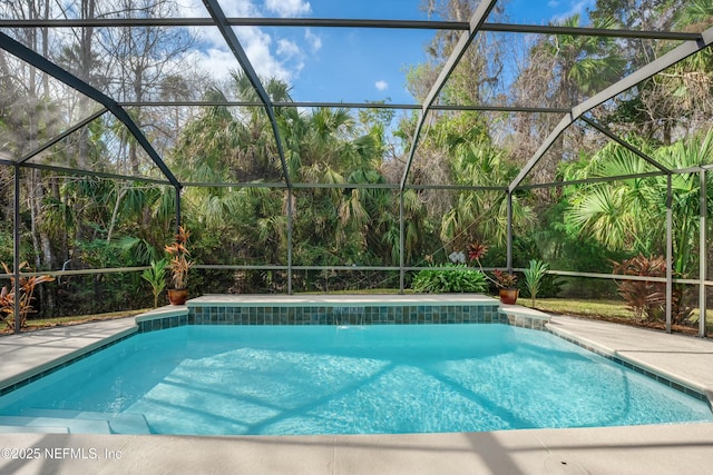 pool featuring glass enclosure