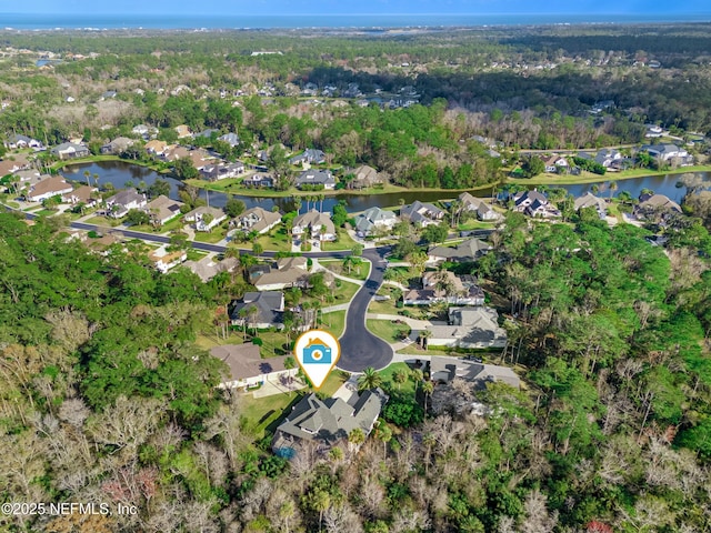 aerial view featuring a residential view and a water view