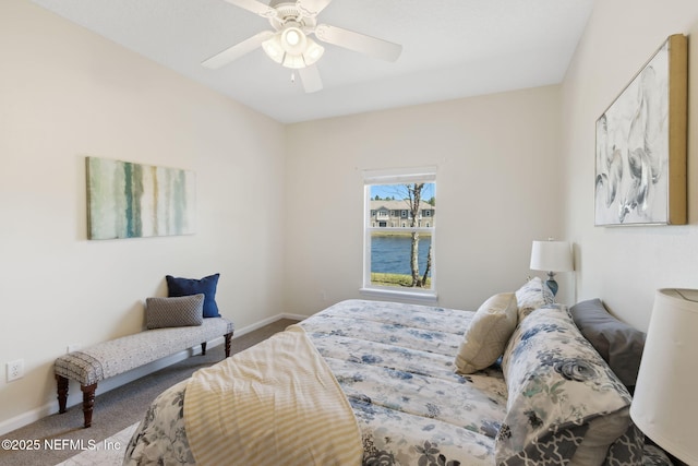 bedroom with carpet floors, ceiling fan, and baseboards