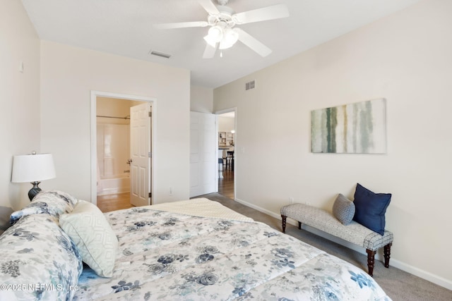 carpeted bedroom with a ceiling fan, visible vents, and baseboards