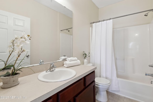 bathroom featuring shower / tub combo with curtain, vanity, and toilet