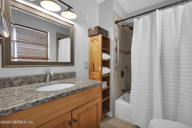 full bathroom with shower / bath combo, vanity, and tile patterned floors