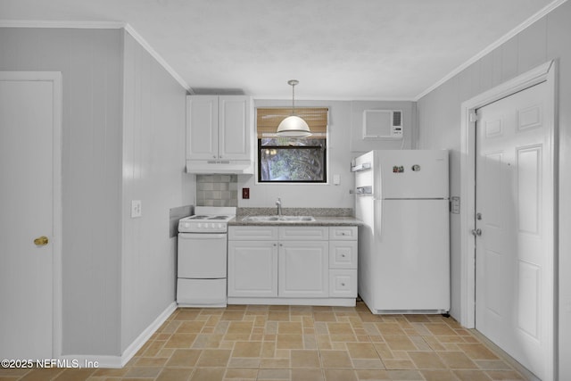 kitchen with under cabinet range hood, white appliances, a sink, white cabinets, and ornamental molding