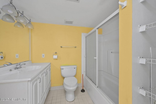 1255 Ponce Island Dr Unit C-733, Saint Augustine, FL 32084 - bathroom with vanity, tile patterned flooring, visible vents, toilet, and baseboards