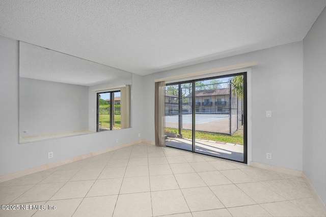 1255 Ponce Island Dr Unit C-733, Saint Augustine, FL 32084 - unfurnished room featuring baseboards and a textured ceiling