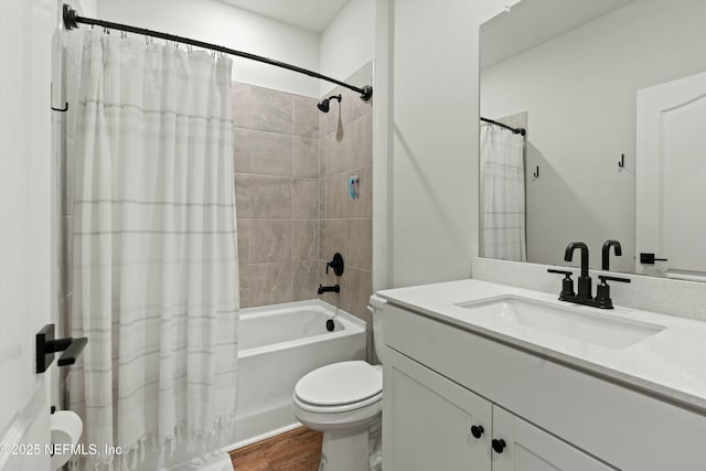 bathroom with shower / tub combo, vanity, toilet, and wood finished floors