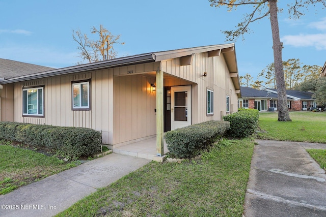 exterior space with a yard