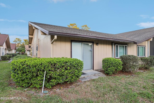 exterior space with a lawn