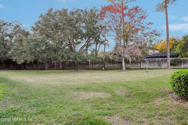 view of yard featuring fence