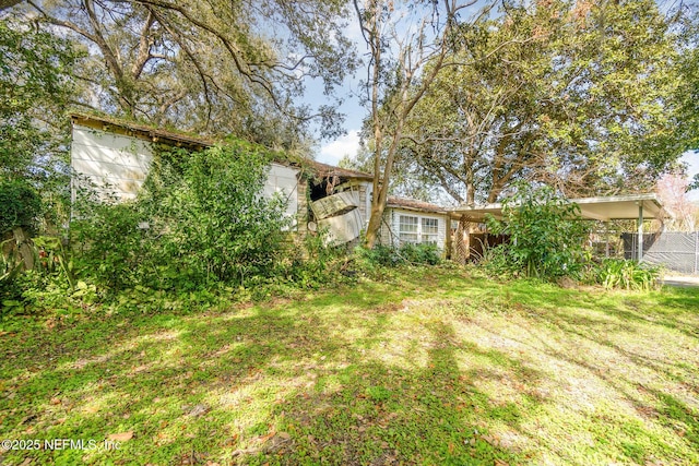 view of yard featuring fence