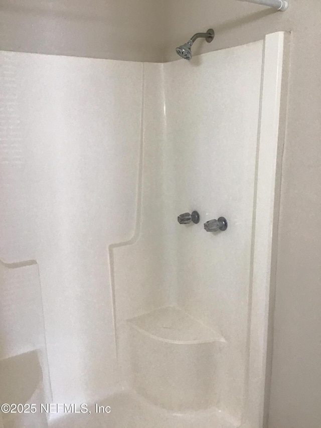 bathroom with a shower