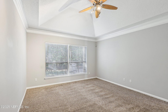 unfurnished room featuring carpet floors, ornamental molding, a ceiling fan, a textured ceiling, and baseboards