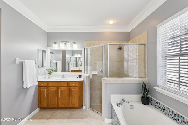 full bath featuring ornamental molding, a stall shower, vanity, and tile patterned floors