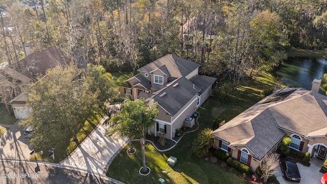 aerial view with a wooded view