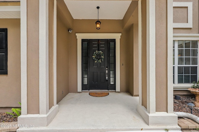 1494 Walnut Creek Dr, Fleming Island, FL 32003 - property entrance with stucco siding